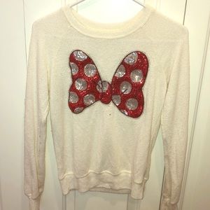 A Sweater with a Minnie mouse bow